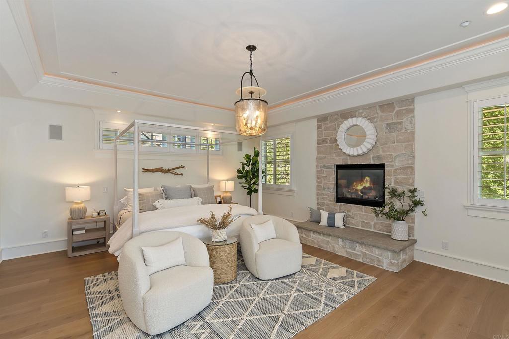 27567 West Shore Road Lake Arrowhead, CA 92352 - Photo 29 of 62 a living room with furniture a fireplace and a window