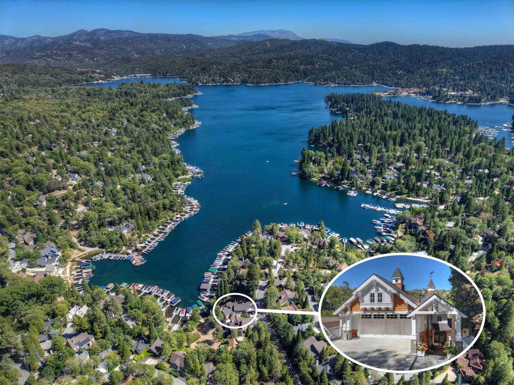 27567 West Shore Road Lake Arrowhead, CA 92352 - Photo 3 of 62 an aerial view of a house with a yard and lake view