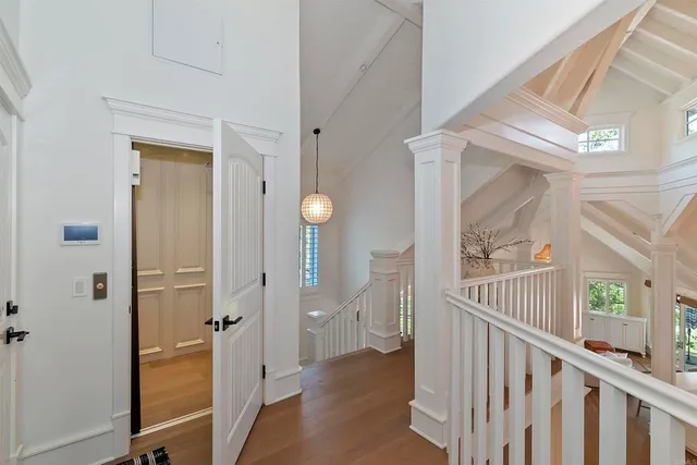 a view of a patio with iron fence
