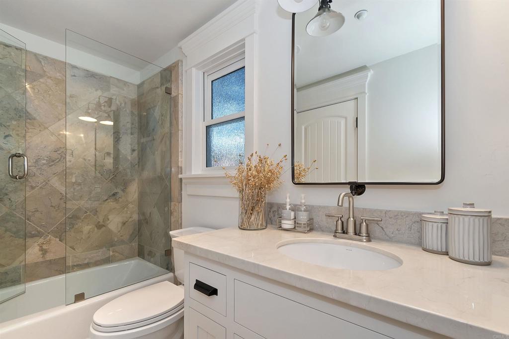 27567 West Shore Road Lake Arrowhead, CA 92352 - Photo 42 of 62 a bathroom with a sink a toilet and shower