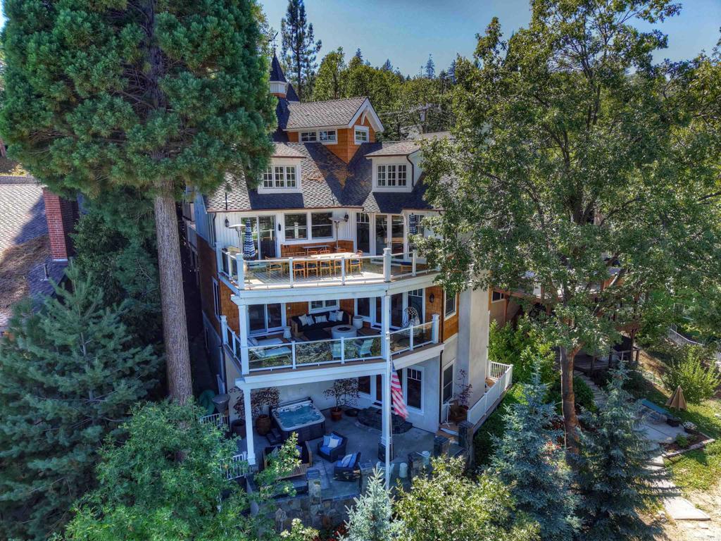 27567 West Shore Road Lake Arrowhead, CA 92352 - Photo 44 of 62 an aerial view of a house with balcony and trees al around