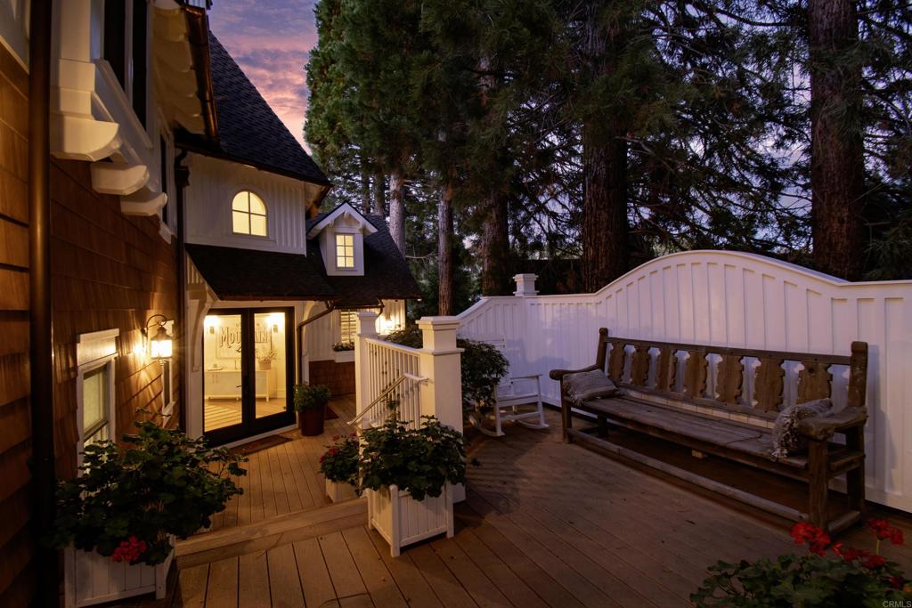27567 West Shore Road Lake Arrowhead, CA 92352 - Photo 49 of 62 a view of a bench in a yard