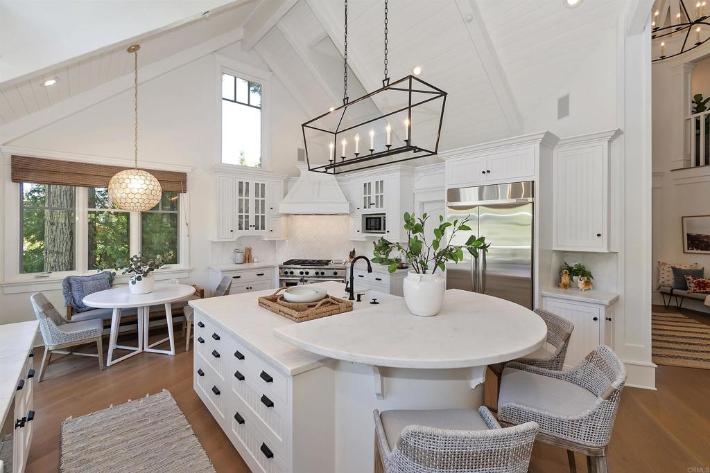 27567 West Shore Road Lake Arrowhead, CA 92352 - Photo 8 of 62 a view of a dining room with furniture window and outside view