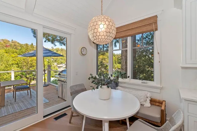 a view of a wooden deck and a patio