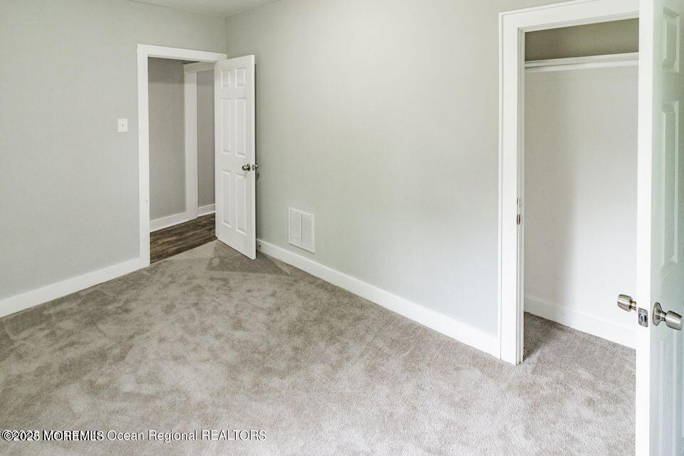 306 Henley Avenue, Unit A Pine Beach, NJ 08741 - Photo 11 of 16 a view of an empty room