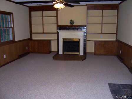 15712 Saddlebrook Road Chesterfield, VA 23838 - Photo 2 of 7 a living room with furniture and a fireplace