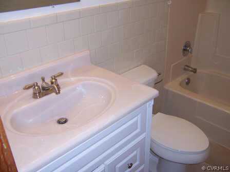 15712 Saddlebrook Road Chesterfield, VA 23838 - Photo 3 of 7 a bathroom with a sink and a toilet