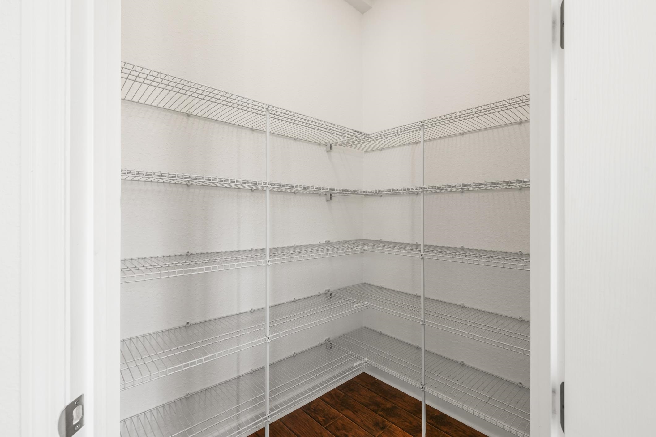 654 Market Street St. Augustine, FL 32095 - Photo 14 of 38 a view of walk in closet with empty racks