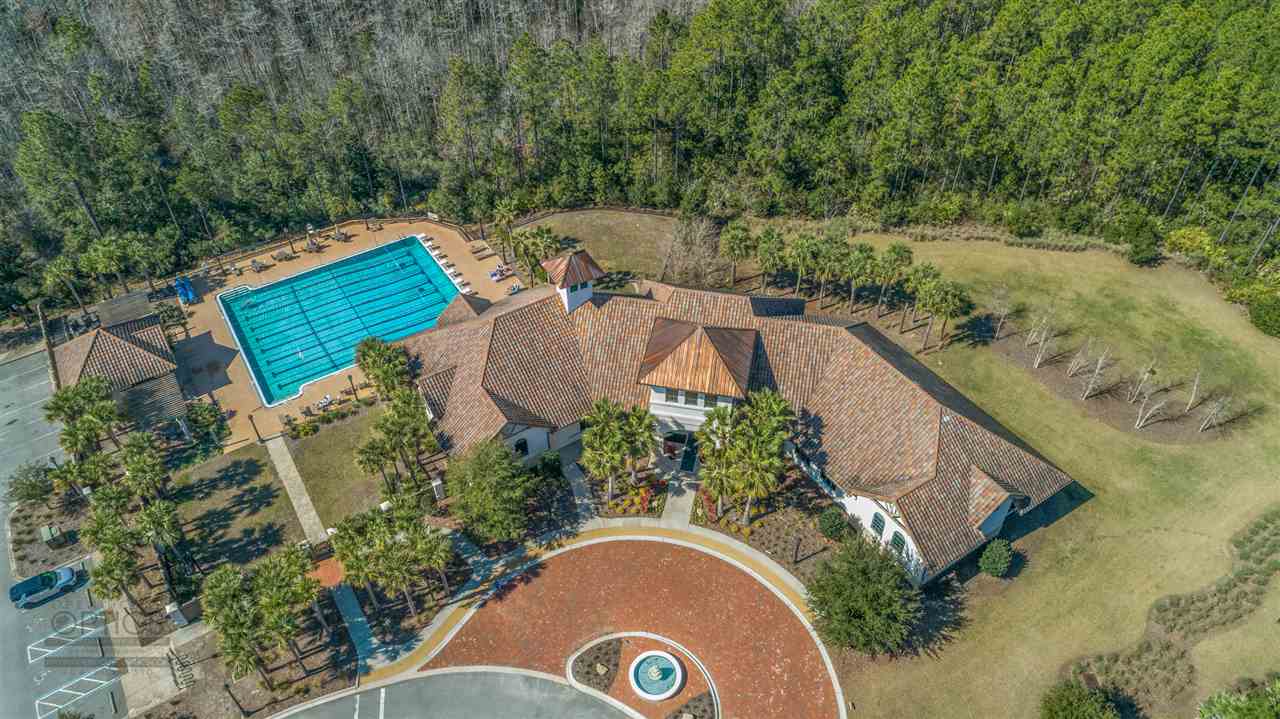 654 Market Street St. Augustine, FL 32095 - Photo 29 of 38 an aerial view of a house with outdoor space and trees all around