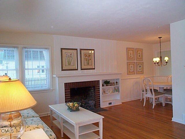 6 Richmond Road Brookfield, CT 06804 - Photo 1 of 1 a living room with furniture and a fireplace