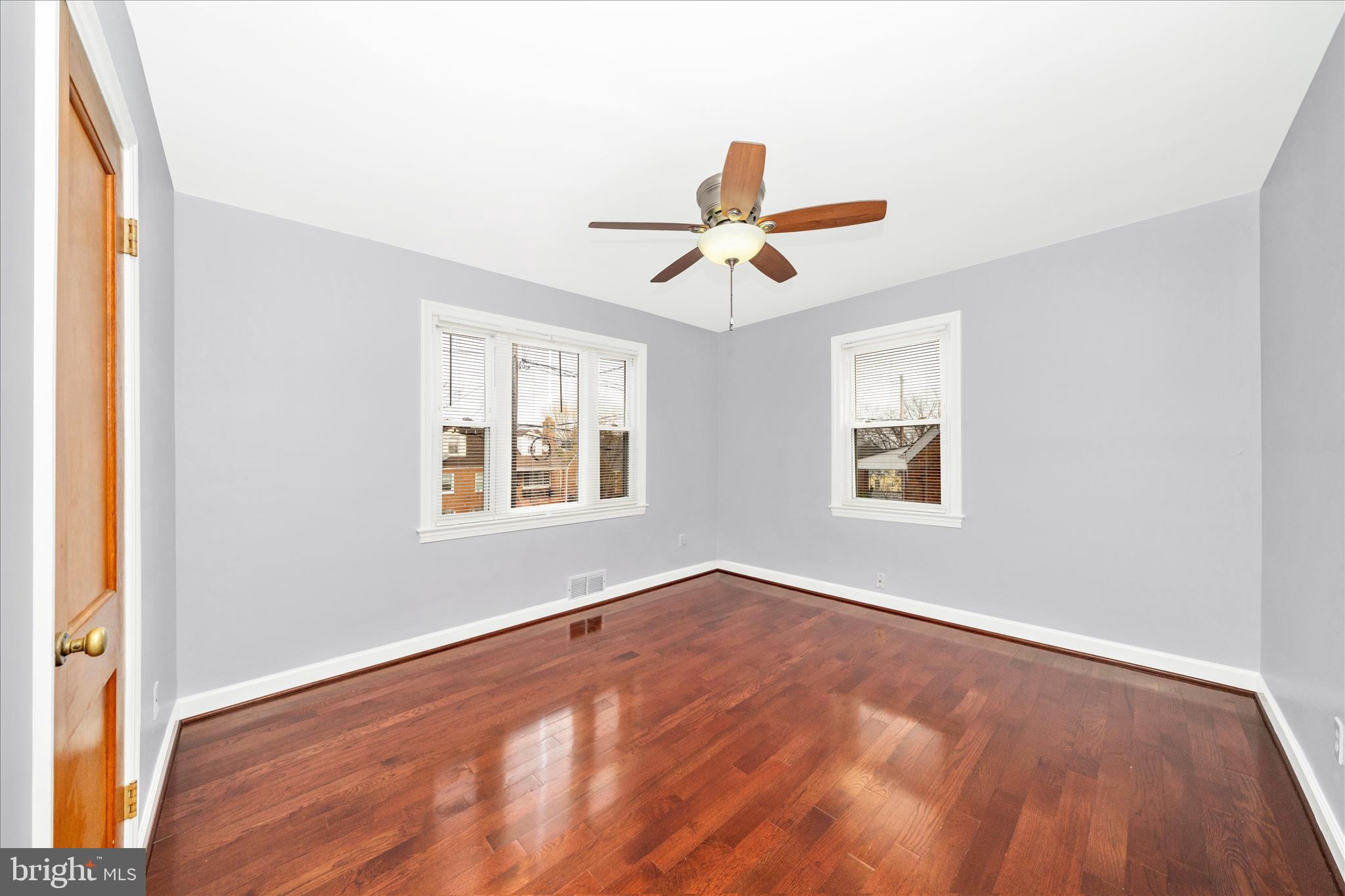 821 Rittenhouse Street Hyattsville, MD 20783 - Photo 19 of 59 wooden floor in an empty room with a window