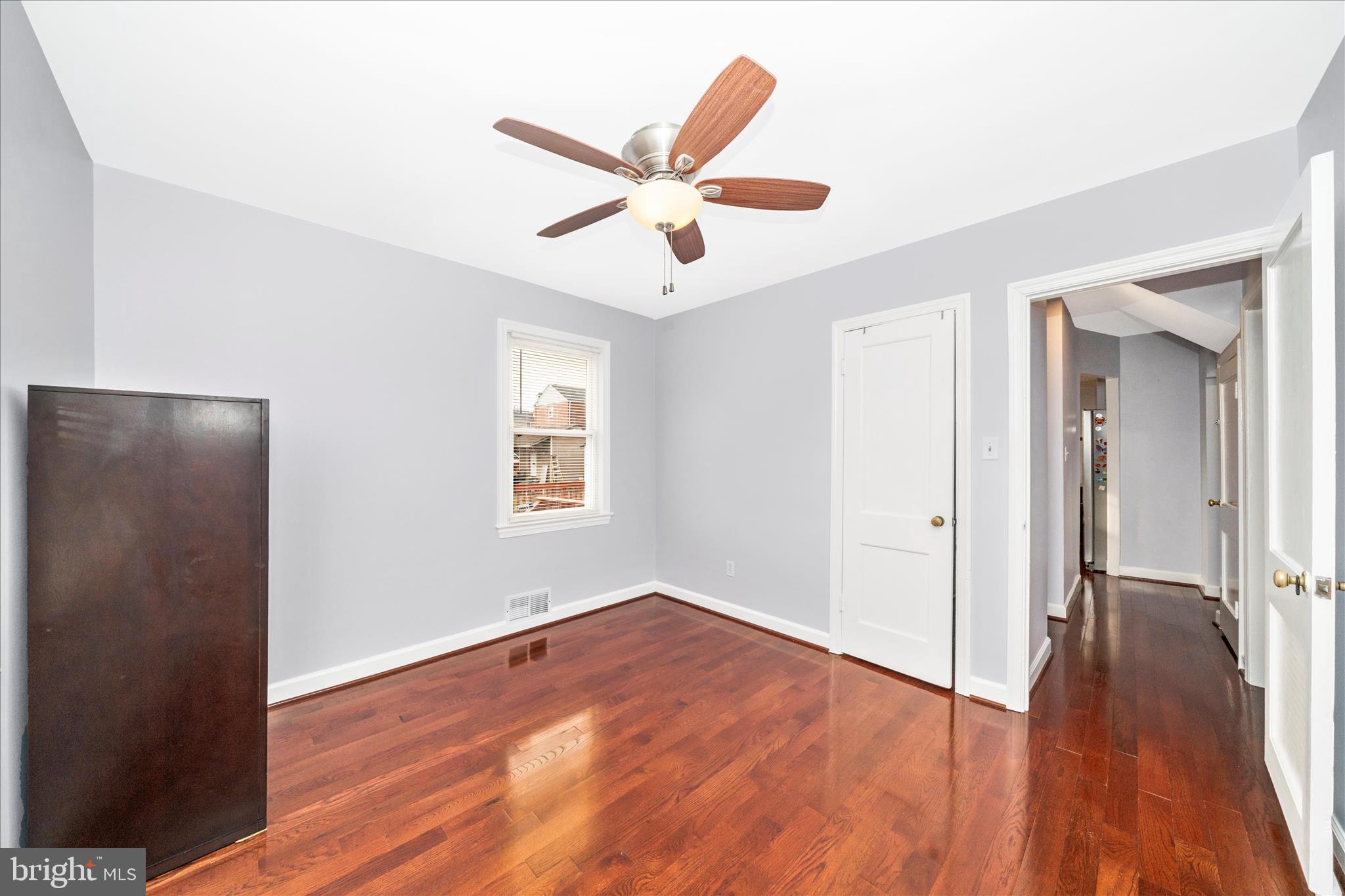 821 Rittenhouse Street Hyattsville, MD 20783 - Photo 25 of 59 wooden floor in an empty room with a window