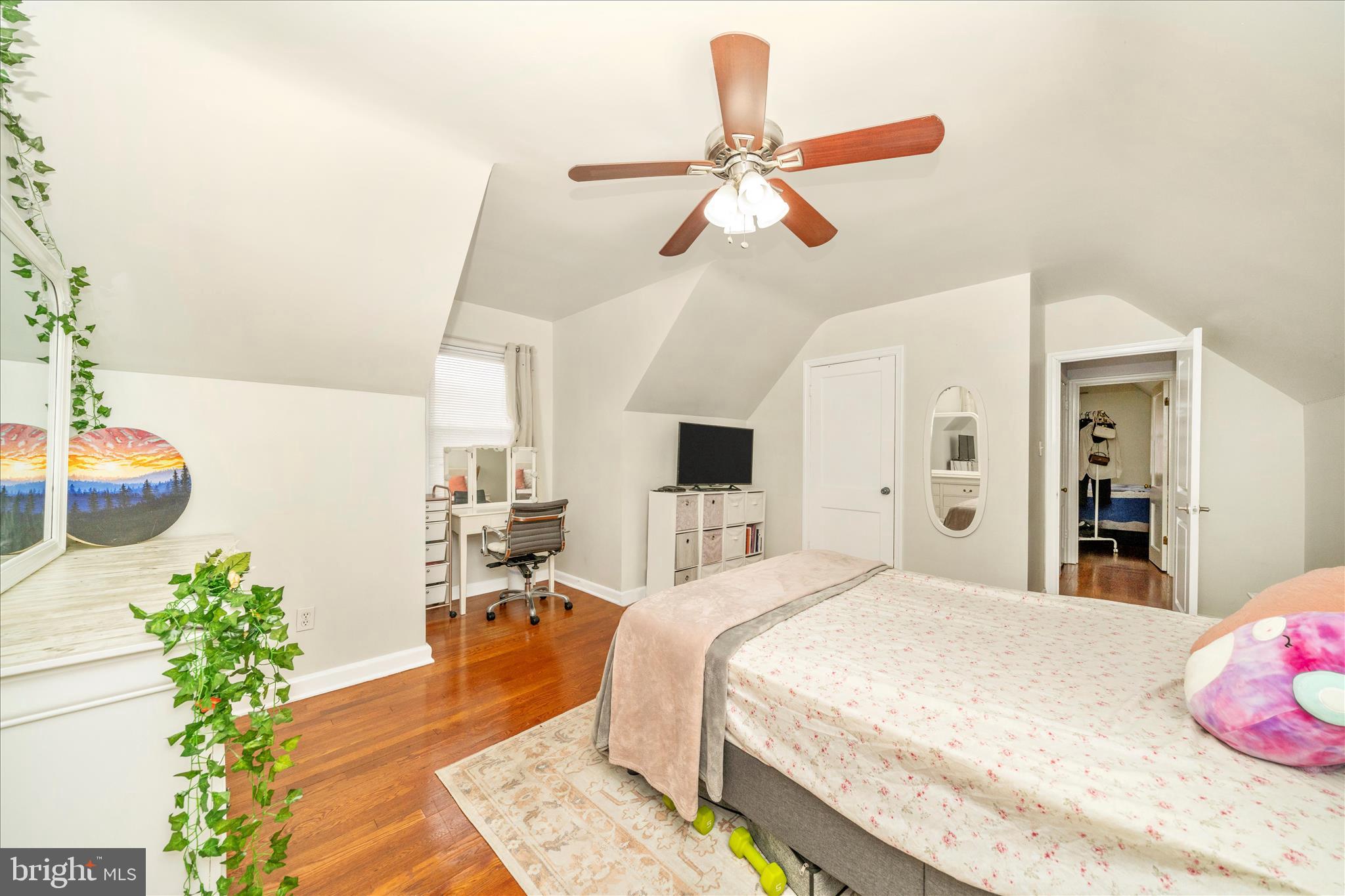 821 Rittenhouse Street Hyattsville, MD 20783 - Photo 34 of 59 a bedroom with a bed and a chandelier