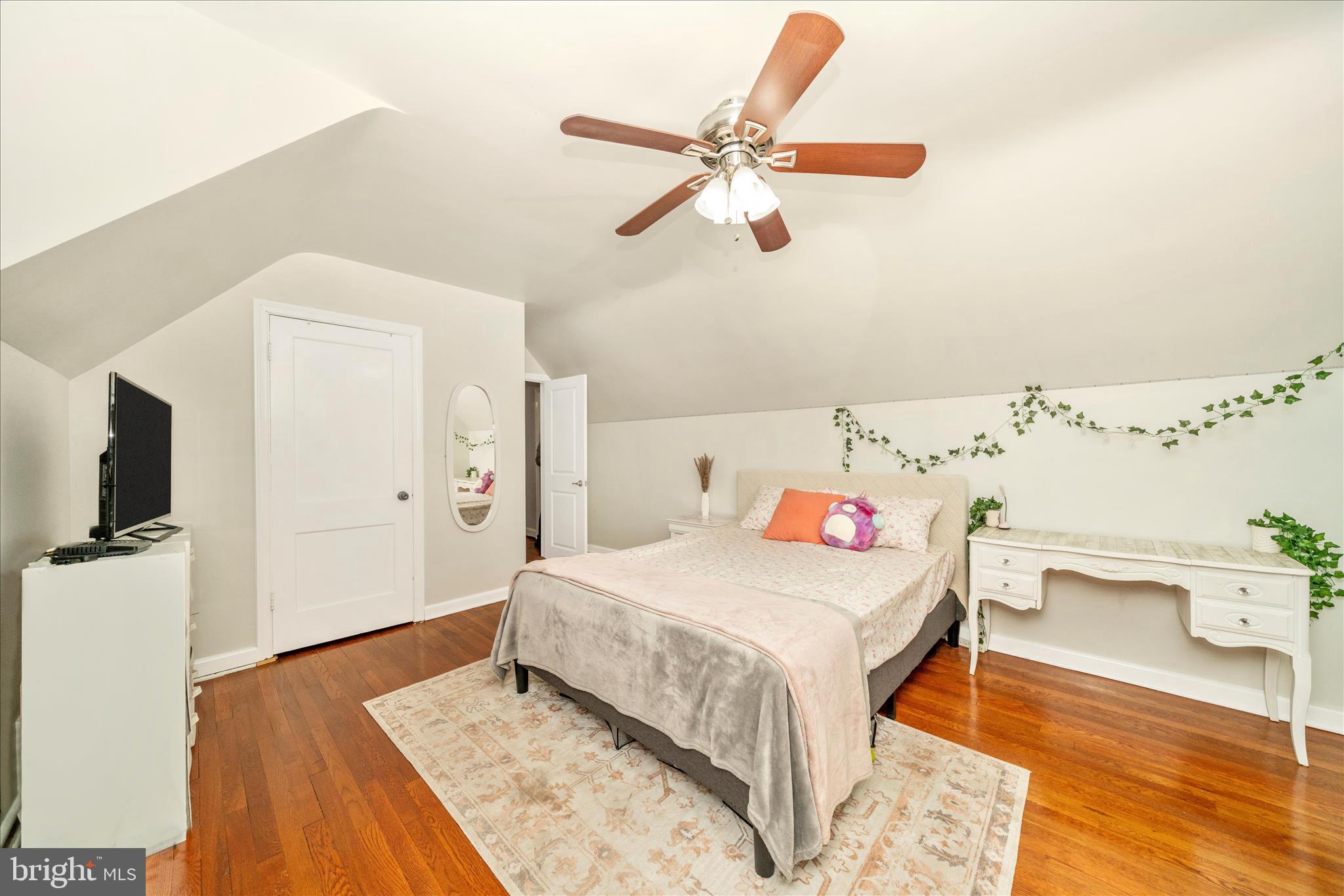 821 Rittenhouse Street Hyattsville, MD 20783 - Photo 35 of 59 a bedroom with a bed and a flat screen tv