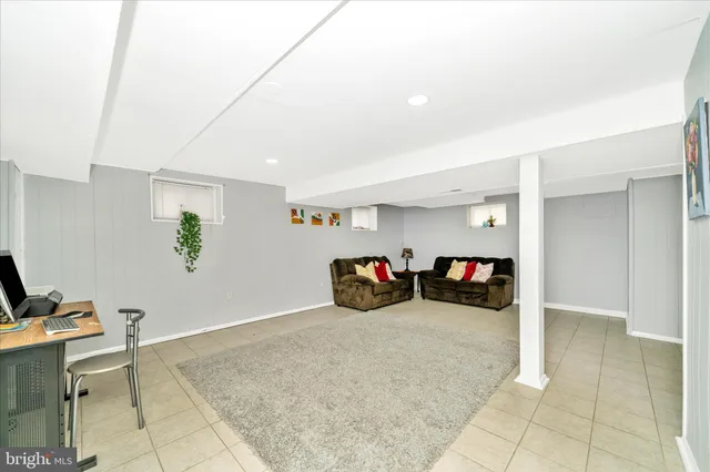 a view of livingroom with washer and dryer