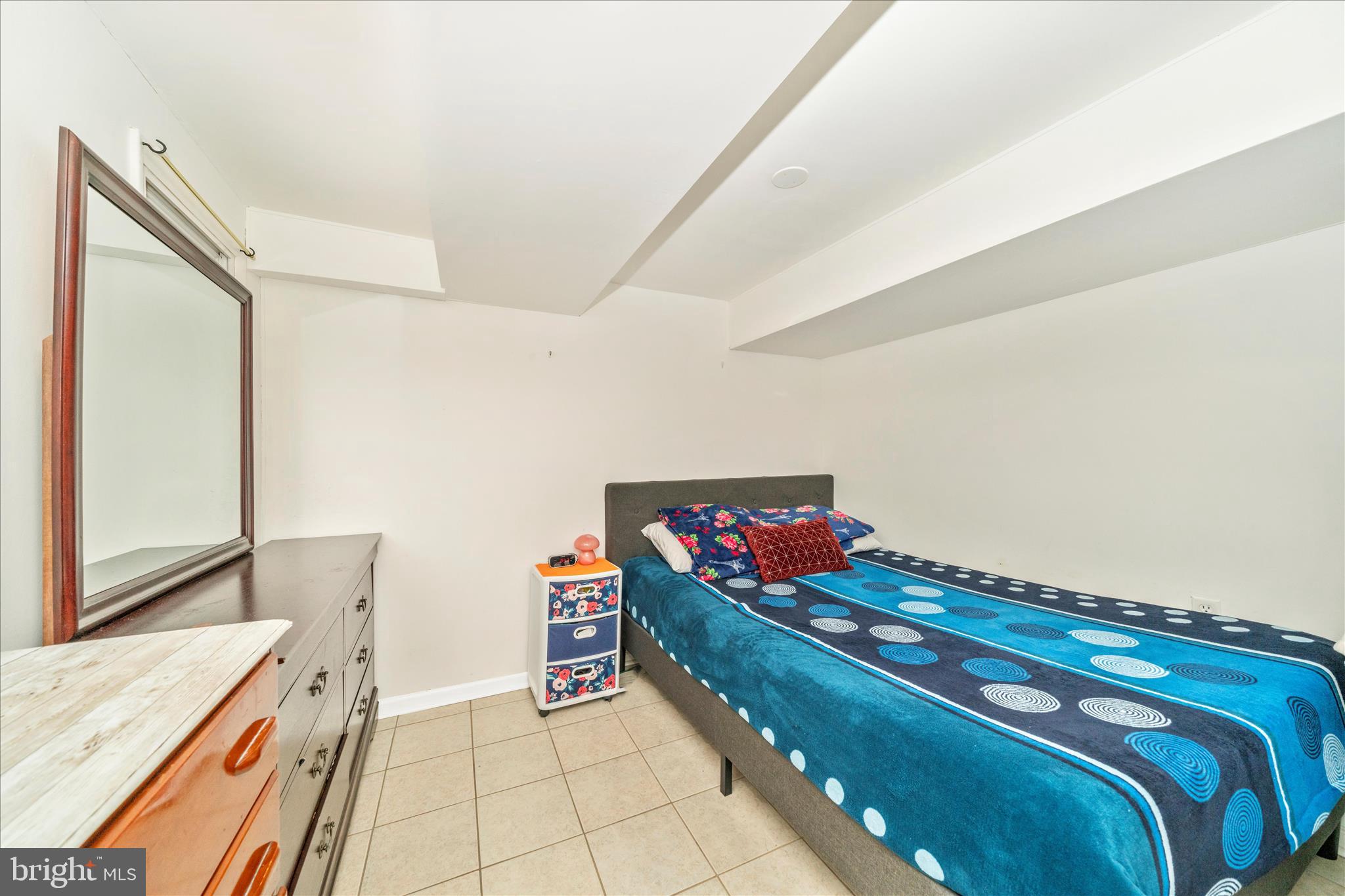 821 Rittenhouse Street Hyattsville, MD 20783 - Photo 39 of 59 a bedroom with a bed and a dresser in it