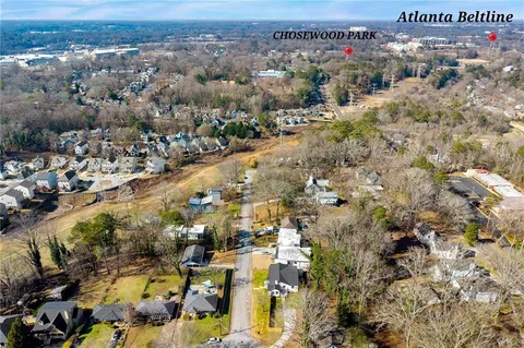an aerial view of residential building and parking space
