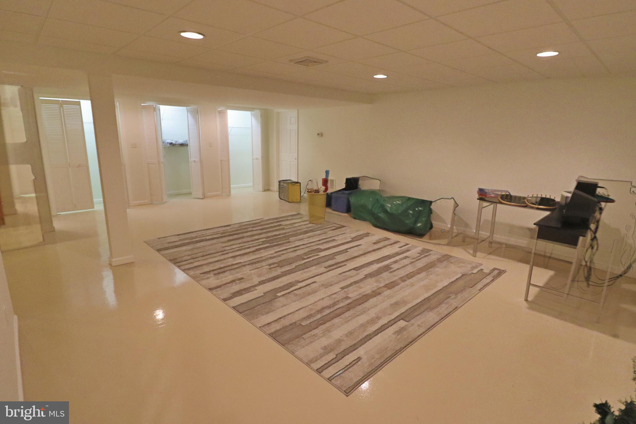 660 Snyder Hill Road Lititz, PA 17543 - Photo 35 of 51 a bedroom with a bed a table and chair