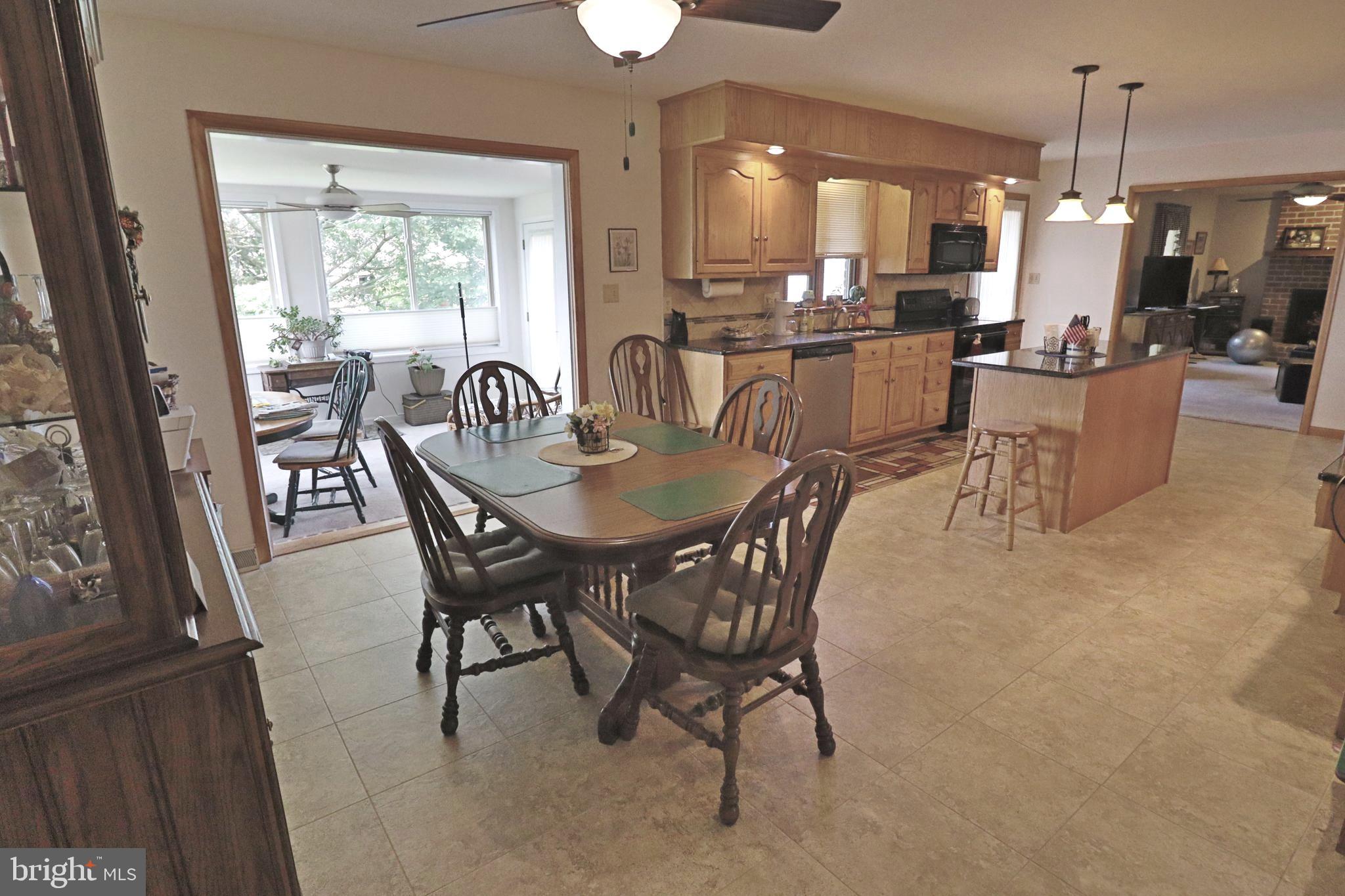 660 Snyder Hill Road Lititz, PA 17543 - Photo 8 of 51 a dining room with furniture window and wooden floor