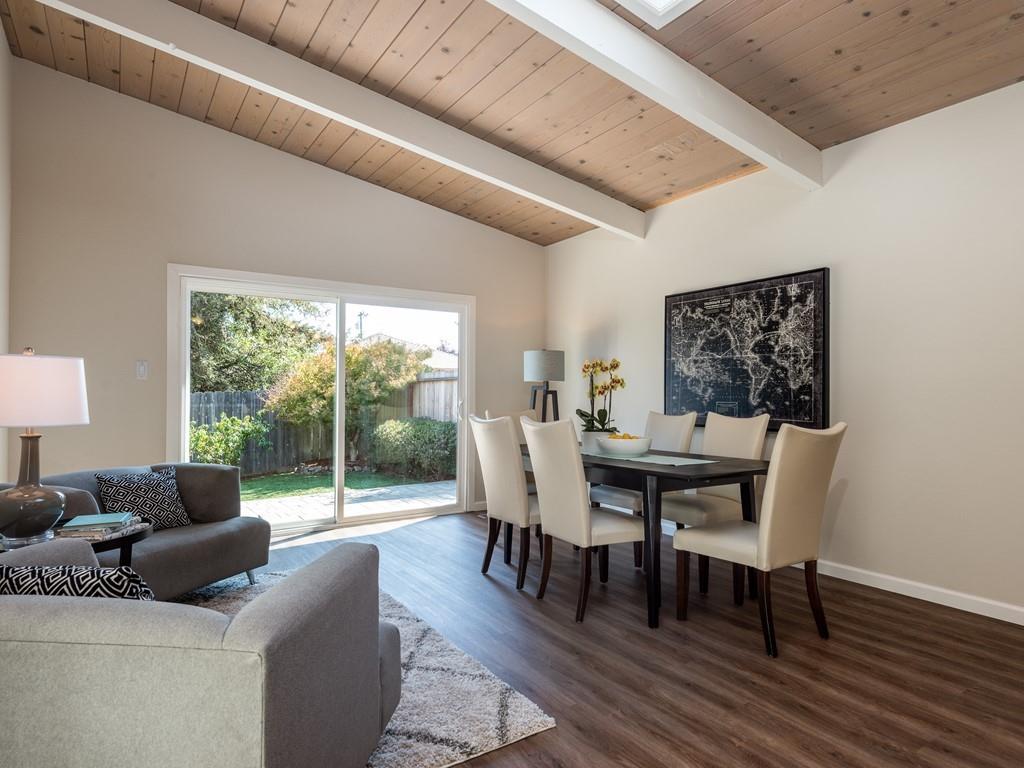 3410 Hillcrest Drive Belmont, CA 94002 - Photo 11 of 26 a view of a dining room with furniture window and outside view