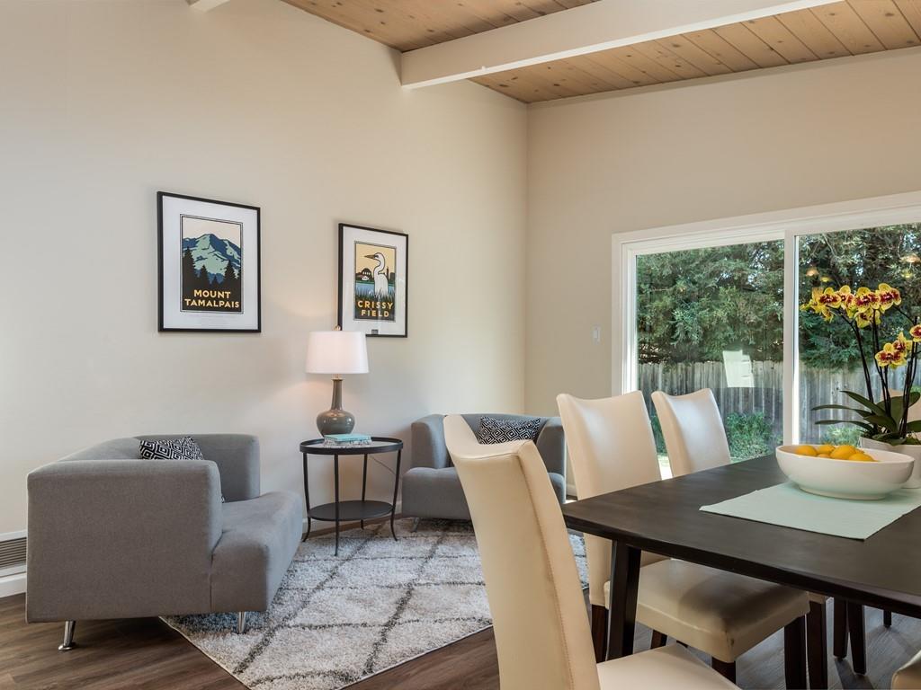 3410 Hillcrest Drive Belmont, CA 94002 - Photo 12 of 26 a view of a dining room with furniture window and outside view