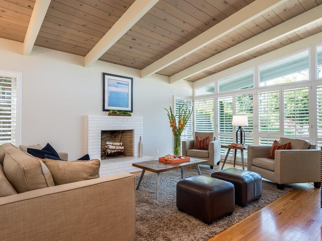3410 Hillcrest Drive Belmont, CA 94002 - Photo 4 of 26 a living room with furniture and a fireplace