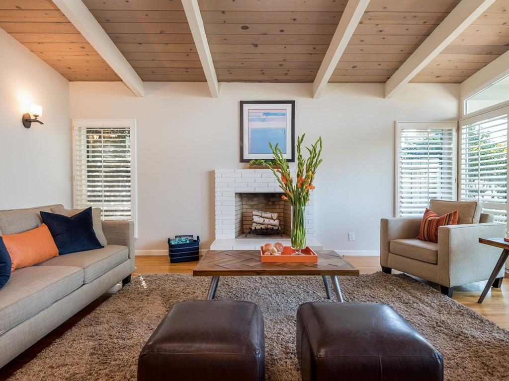 3410 Hillcrest Drive Belmont, CA 94002 - Photo 5 of 26 a living room with furniture and a fireplace