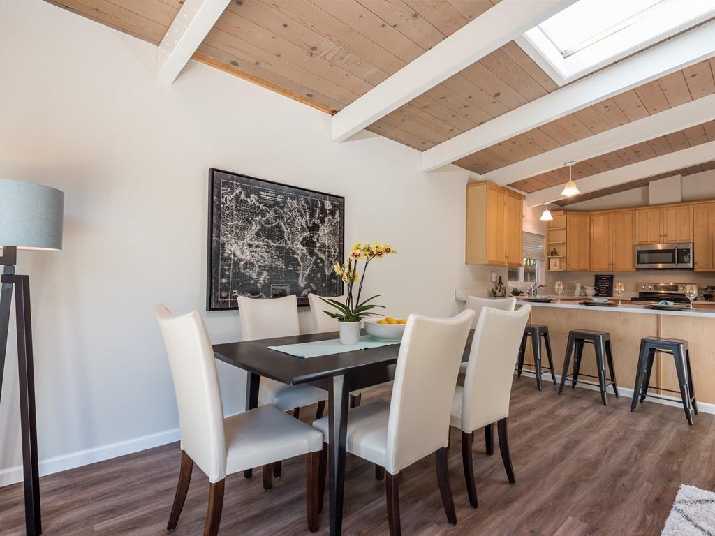 3410 Hillcrest Drive Belmont, CA 94002 - Photo 10 of 26 a view of a dining room with furniture and wooden floor