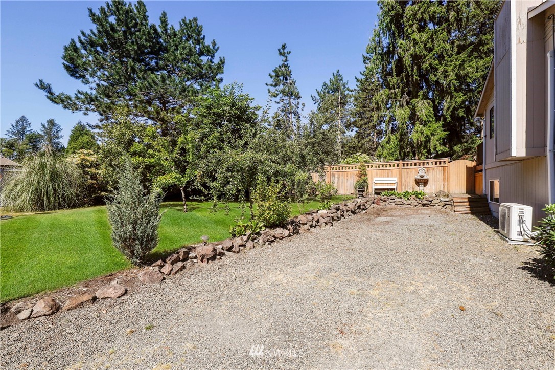 1417 234th Street Southwest Bothell, WA 98021 - Photo 36 of 40 a view of a street with a tree