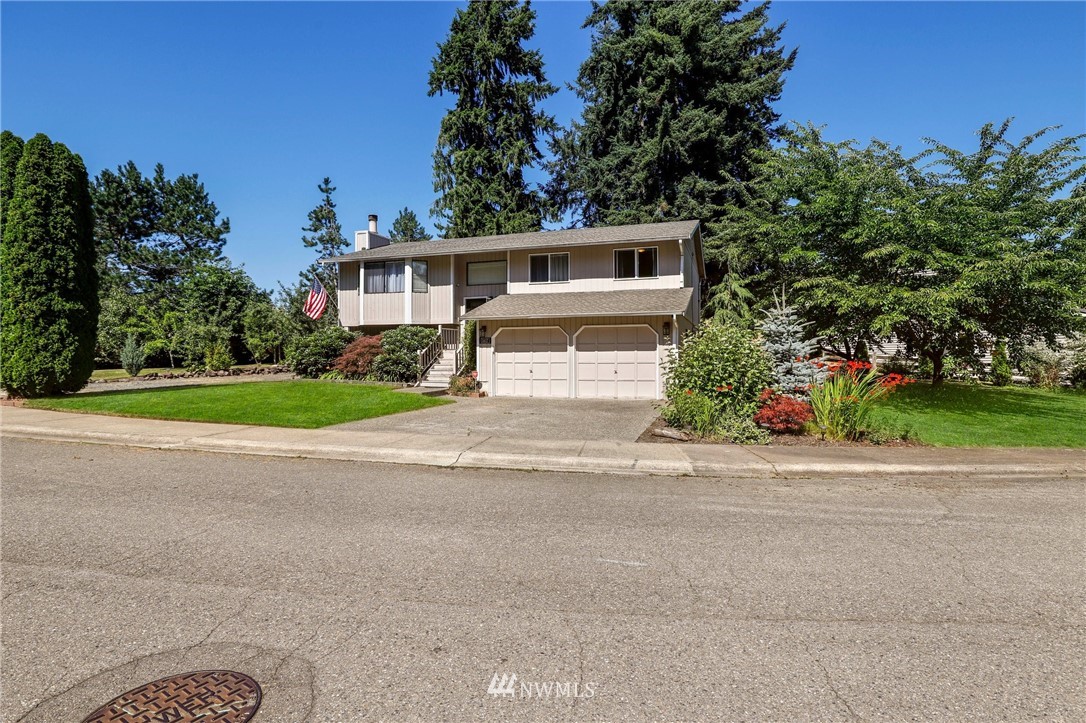 1417 234th Street Southwest Bothell, WA 98021 - Photo 38 of 40 front view of a house with a yard