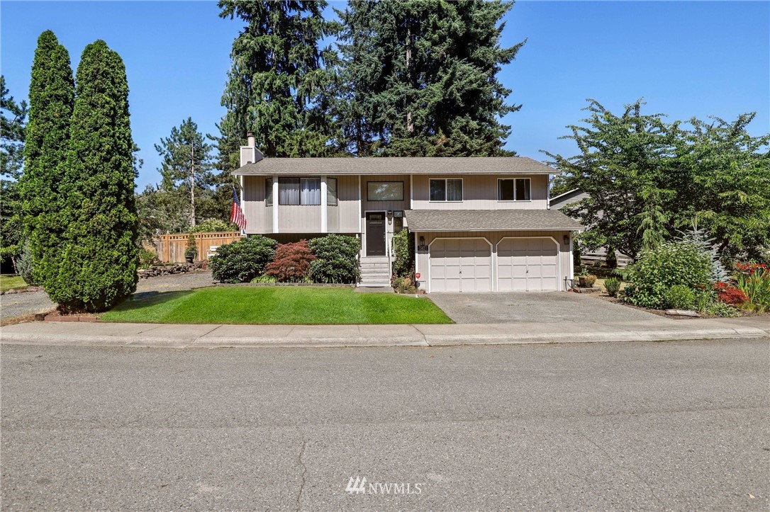 1417 234th Street Southwest Bothell, WA 98021 - Photo 39 of 40 front view of a house with a yard