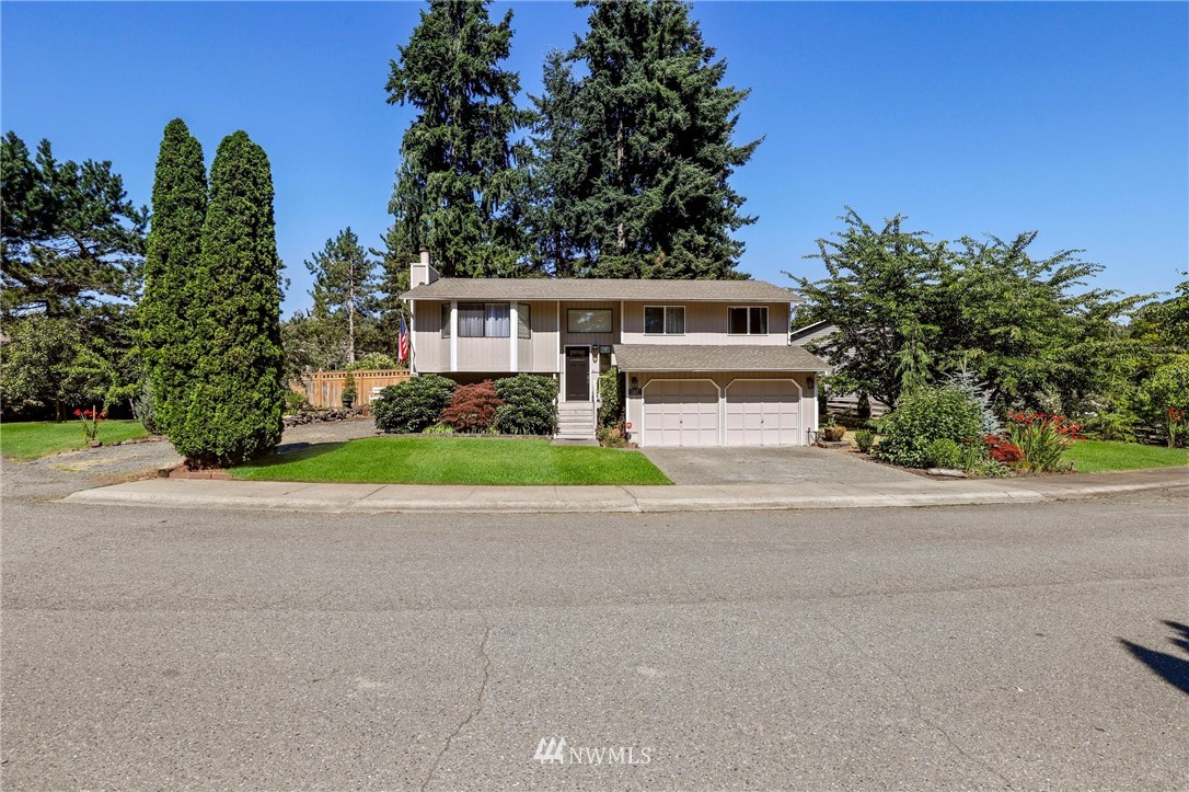 1417 234th Street Southwest Bothell, WA 98021 - Photo 40 of 40 front view of a house with a yard
