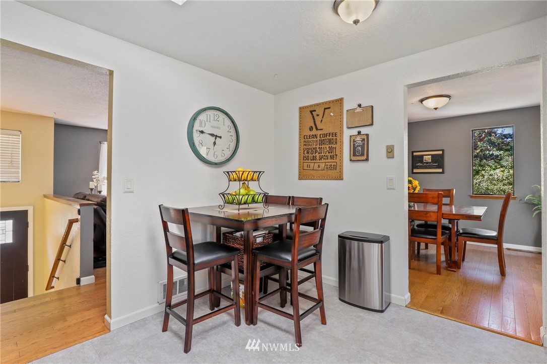 1417 234th Street Southwest Bothell, WA 98021 - Photo 10 of 40 a view of a dining room with furniture