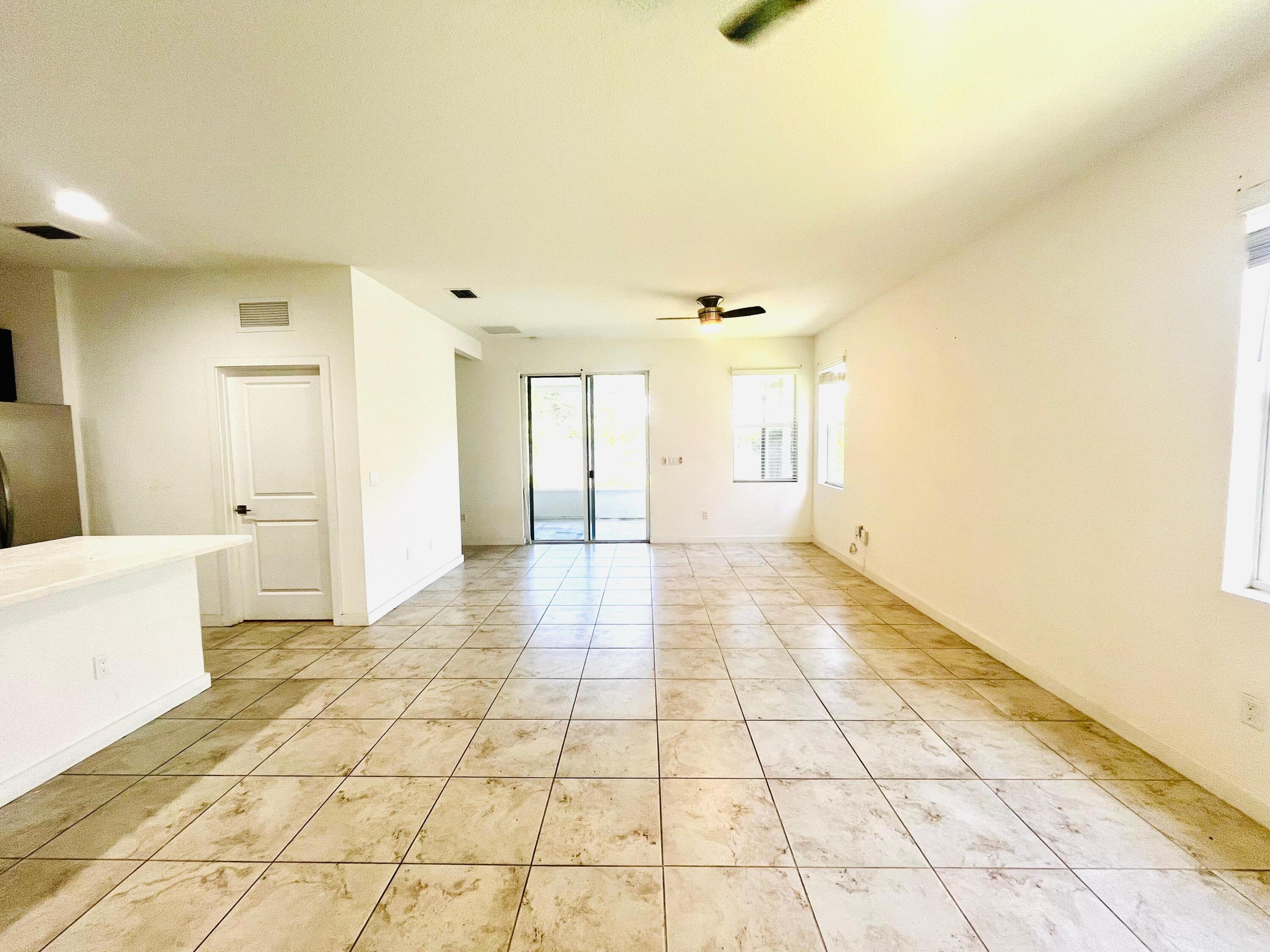 6089 Wildfire Way West Palm Beach, FL 33415 - Photo 2 of 21 a view of an empty room