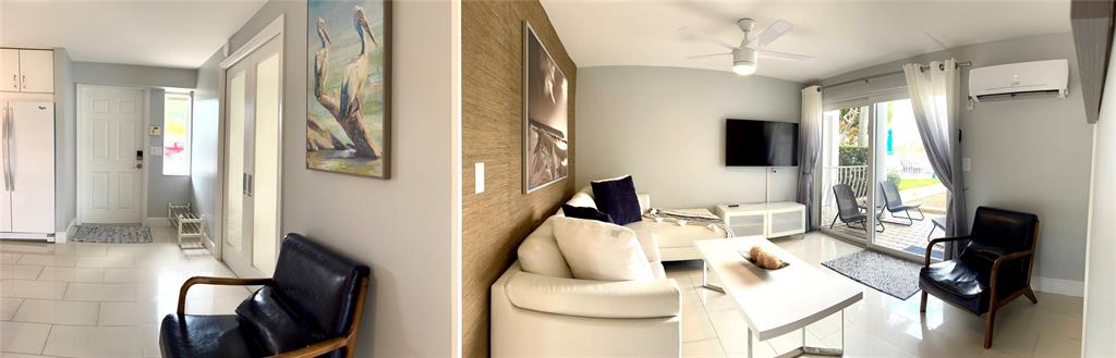 1705 North Riverside Drive, Unit 2 Pompano Beach, FL 33062 - Photo 17 of 60 a living room with furniture and a flat screen tv