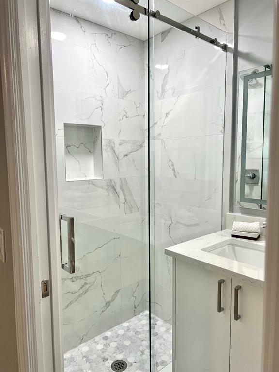 1705 North Riverside Drive, Unit 2 Pompano Beach, FL 33062 - Photo 36 of 60 a bathroom with a shower and a sink