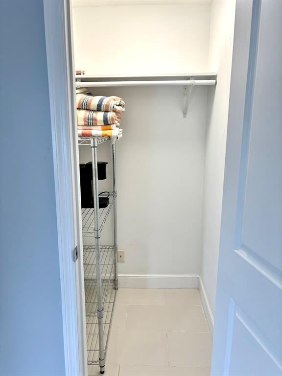 1705 North Riverside Drive, Unit 2 Pompano Beach, FL 33062 - Photo 44 of 60 a bathroom with a window