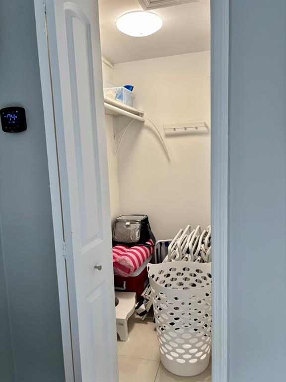 1705 North Riverside Drive, Unit 2 Pompano Beach, FL 33062 - Photo 46 of 60 a bedroom with a bed and a window