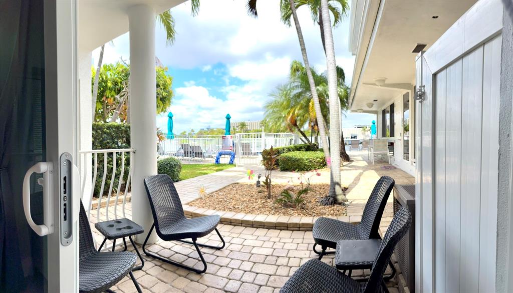 1705 North Riverside Drive, Unit 2 Pompano Beach, FL 33062 - Photo 47 of 60 a view of a dining room with furniture window and outside view