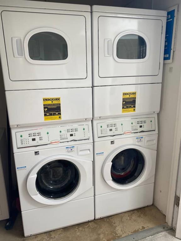 1705 North Riverside Drive, Unit 2 Pompano Beach, FL 33062 - Photo 57 of 60 a utility room with dryer and washer