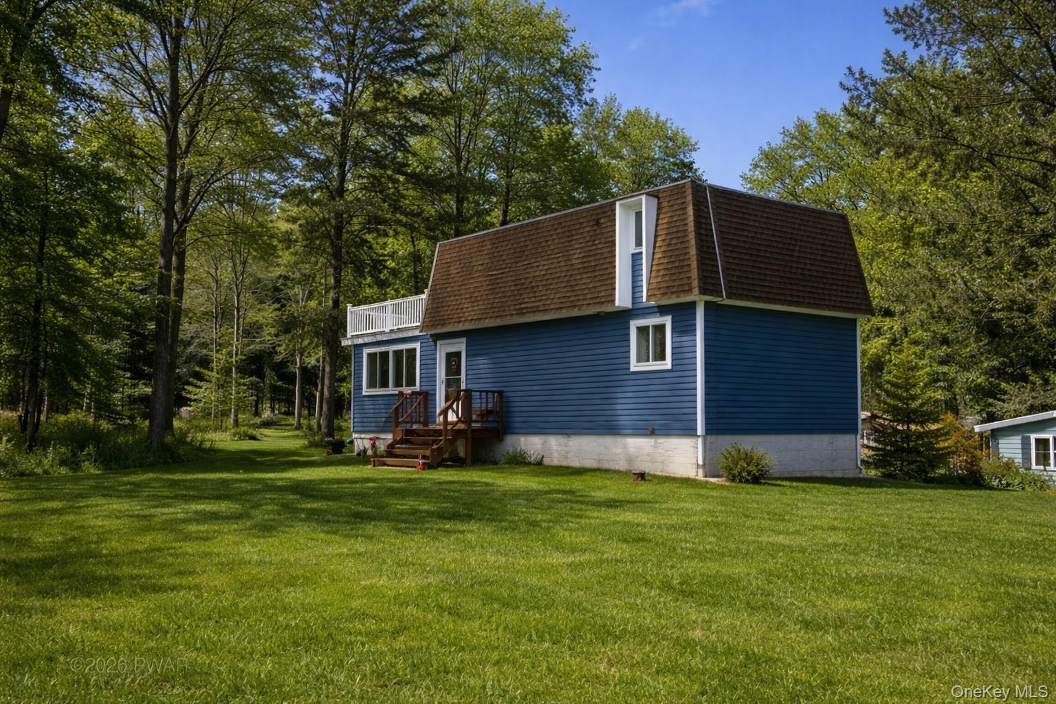 2492 State Rt 17B Bethel, NY 12726 - Photo 4 of 26 a view of a house with a yard