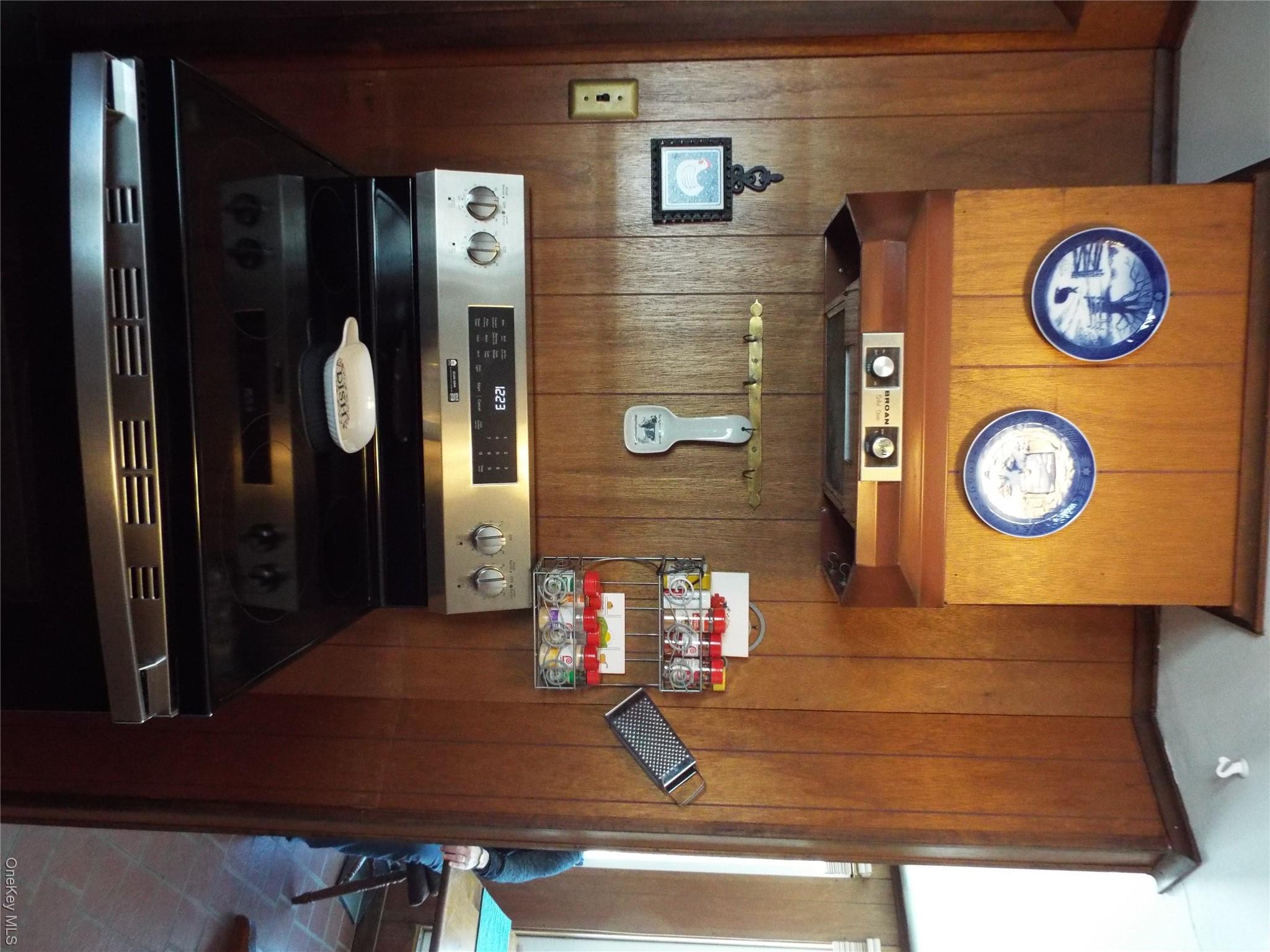 2492 State Rt 17B Bethel, NY 12726 - Photo 7 of 26 a kitchen with a stove and a refrigerator