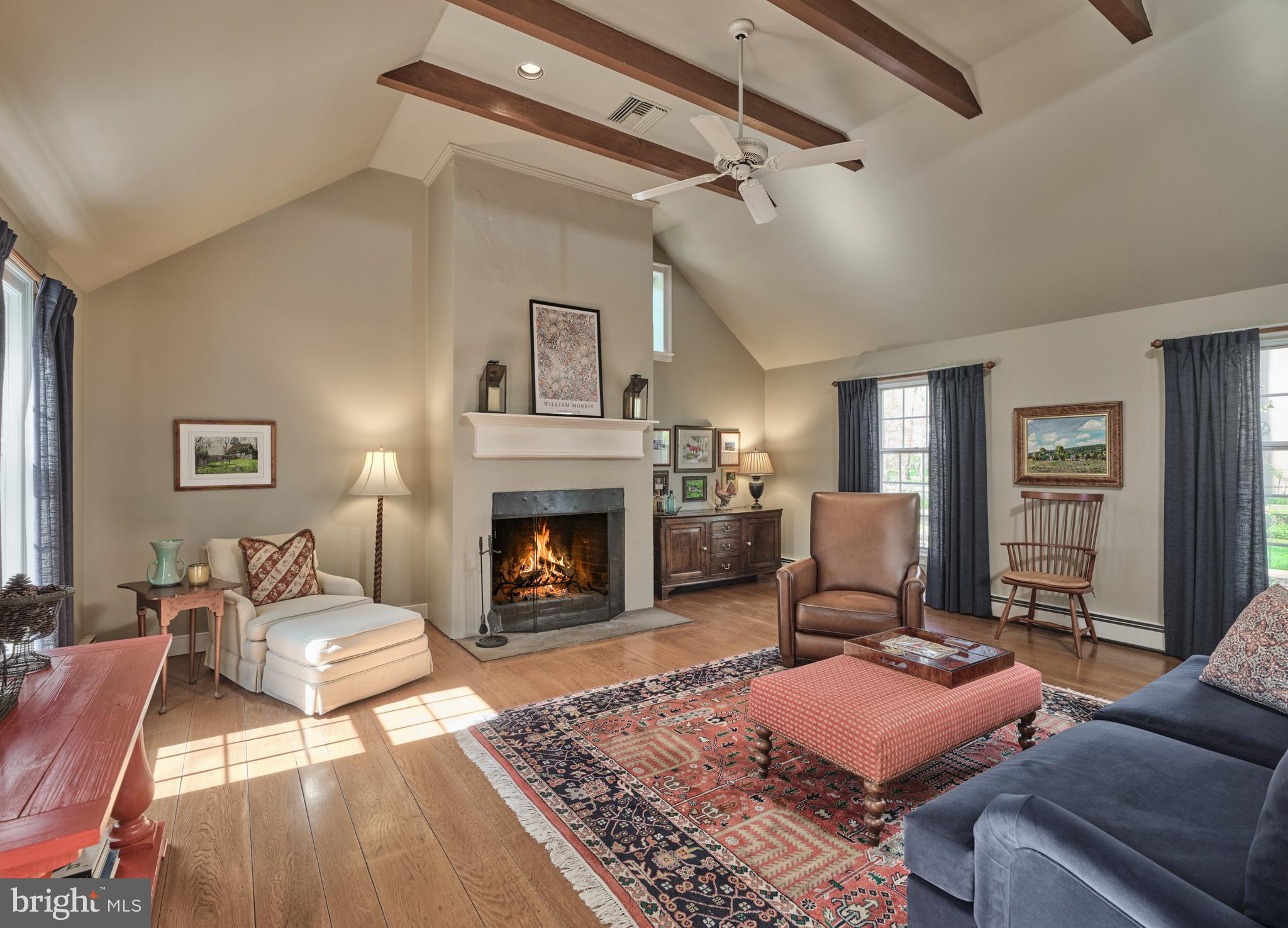 2976 River Road New Hope, PA 18938 - Photo 5 of 37 a living room with furniture and a fireplace