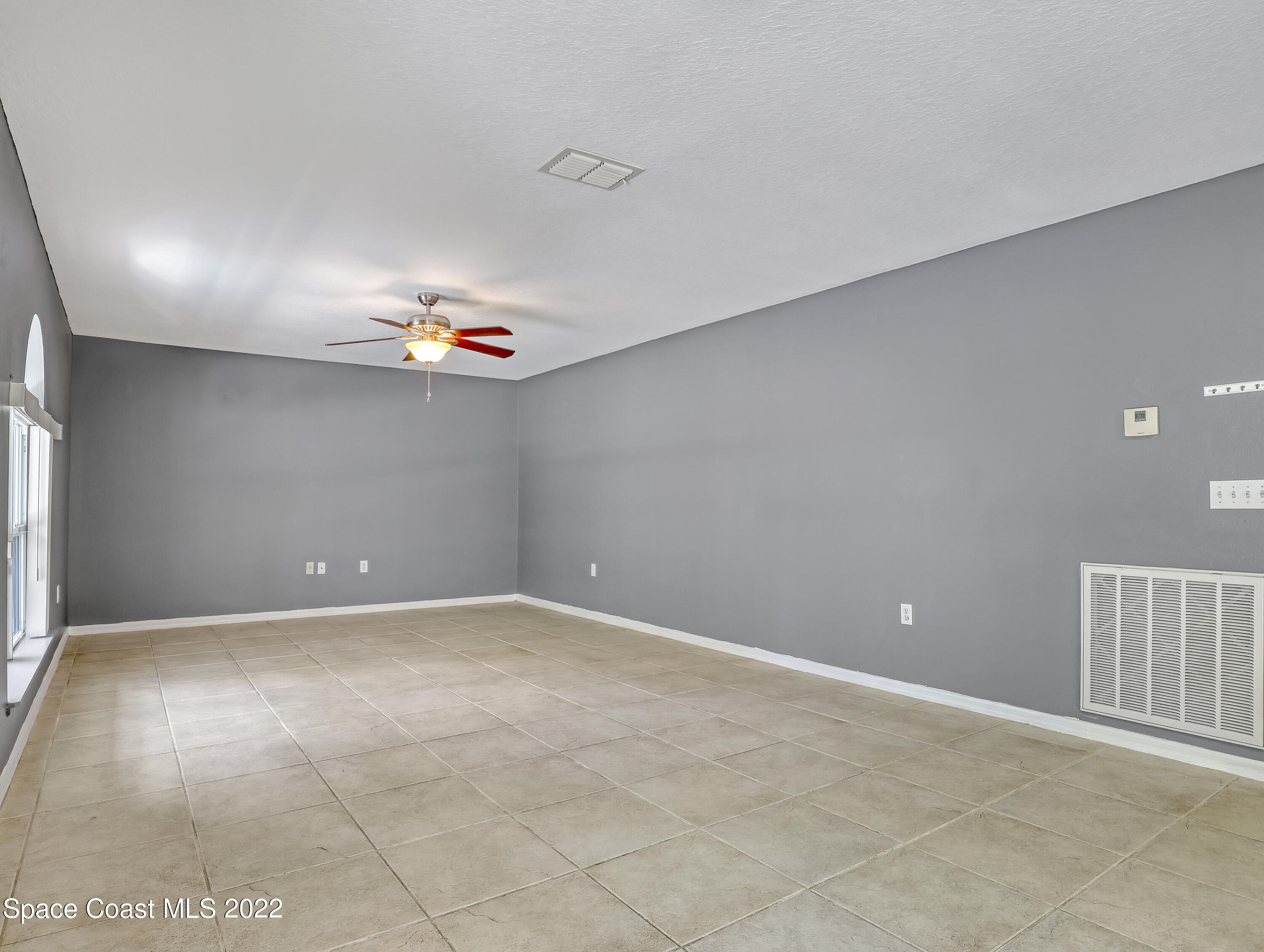 4764 Doreen Road Cocoa, FL 32927 - Photo 12 of 54 a view of an empty room