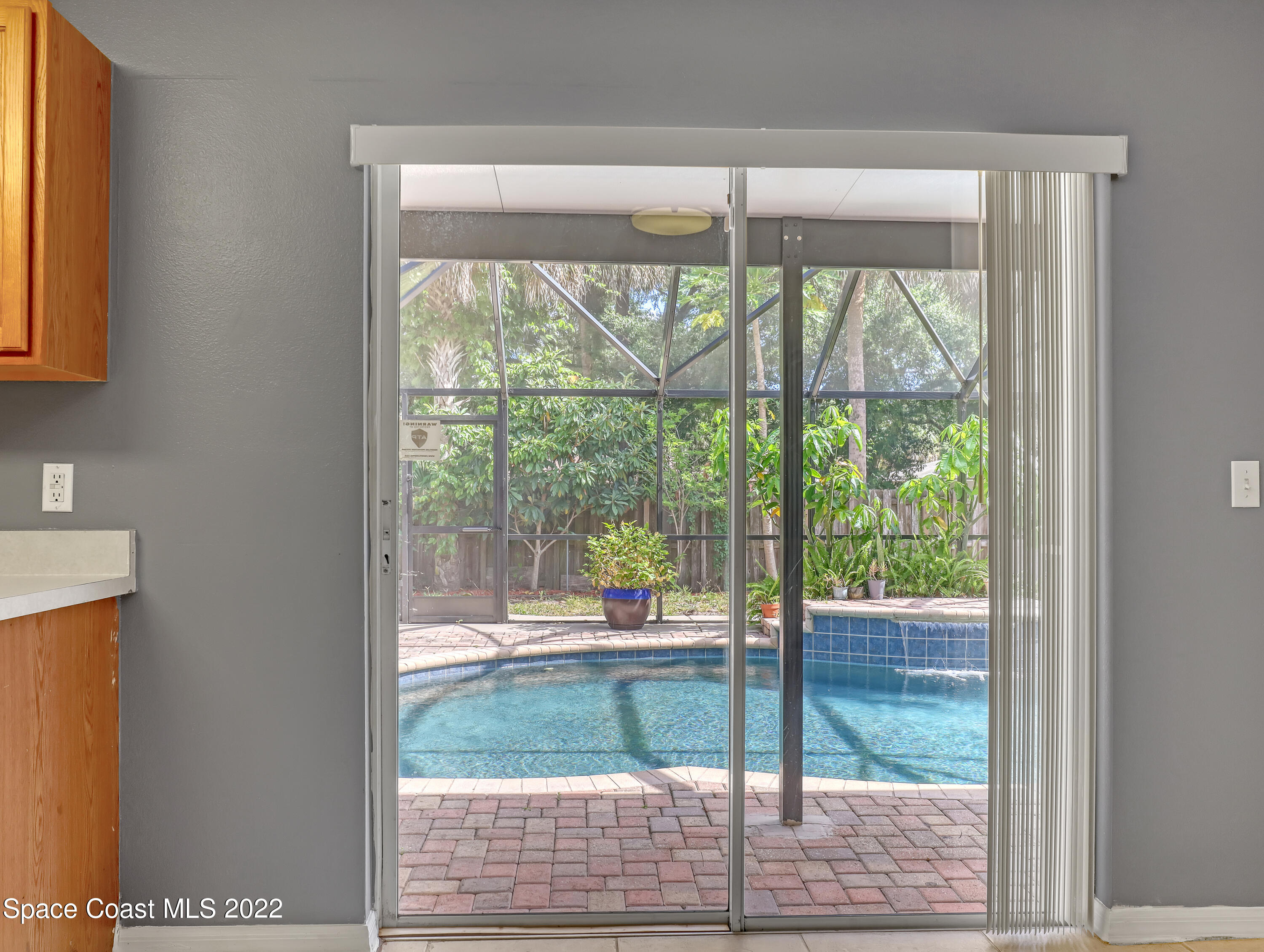 4764 Doreen Road Cocoa, FL 32927 - Photo 14 of 54 a view of backyard with window