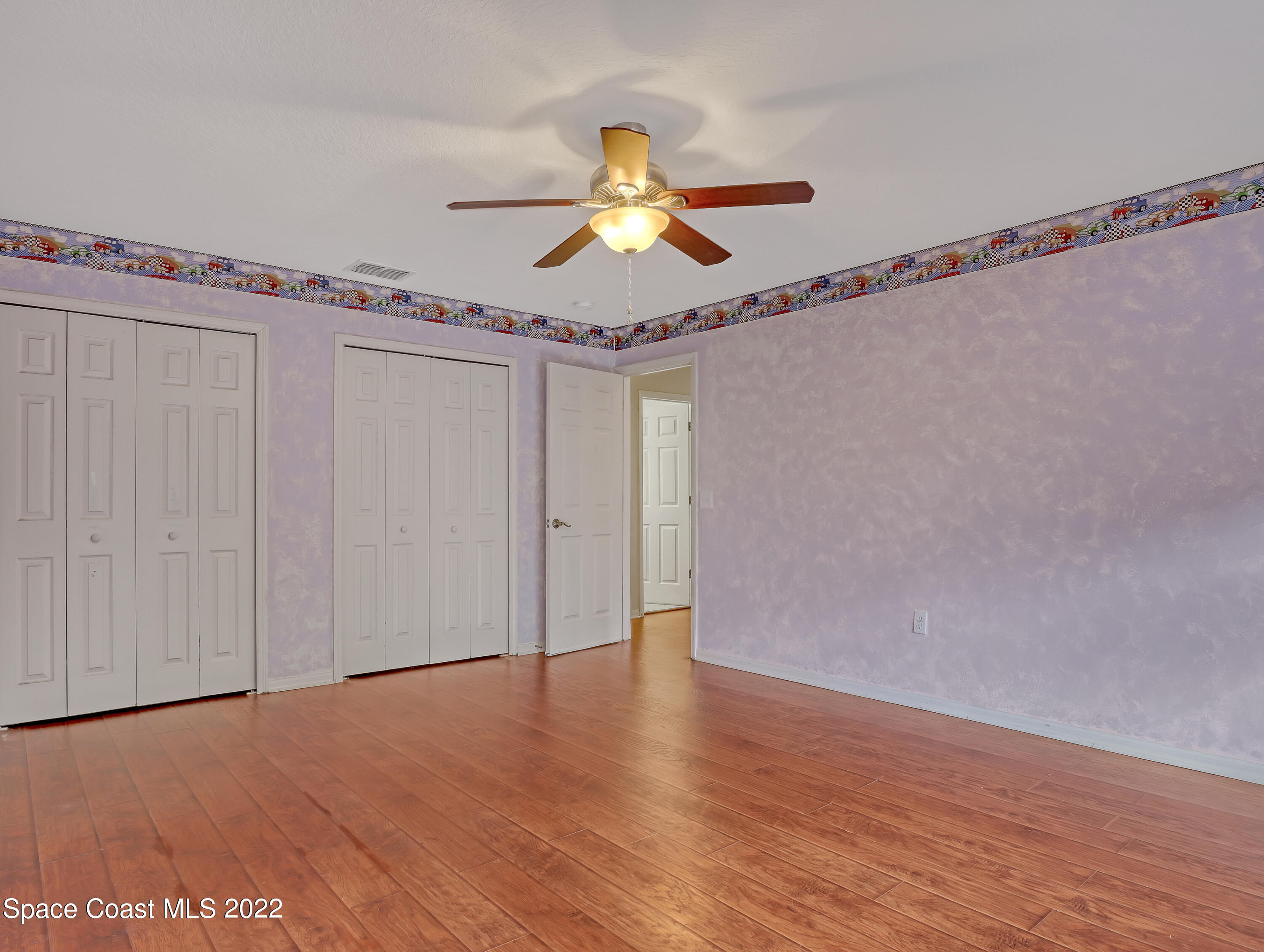 4764 Doreen Road Cocoa, FL 32927 - Photo 34 of 54 a view of entryway with wooden floor