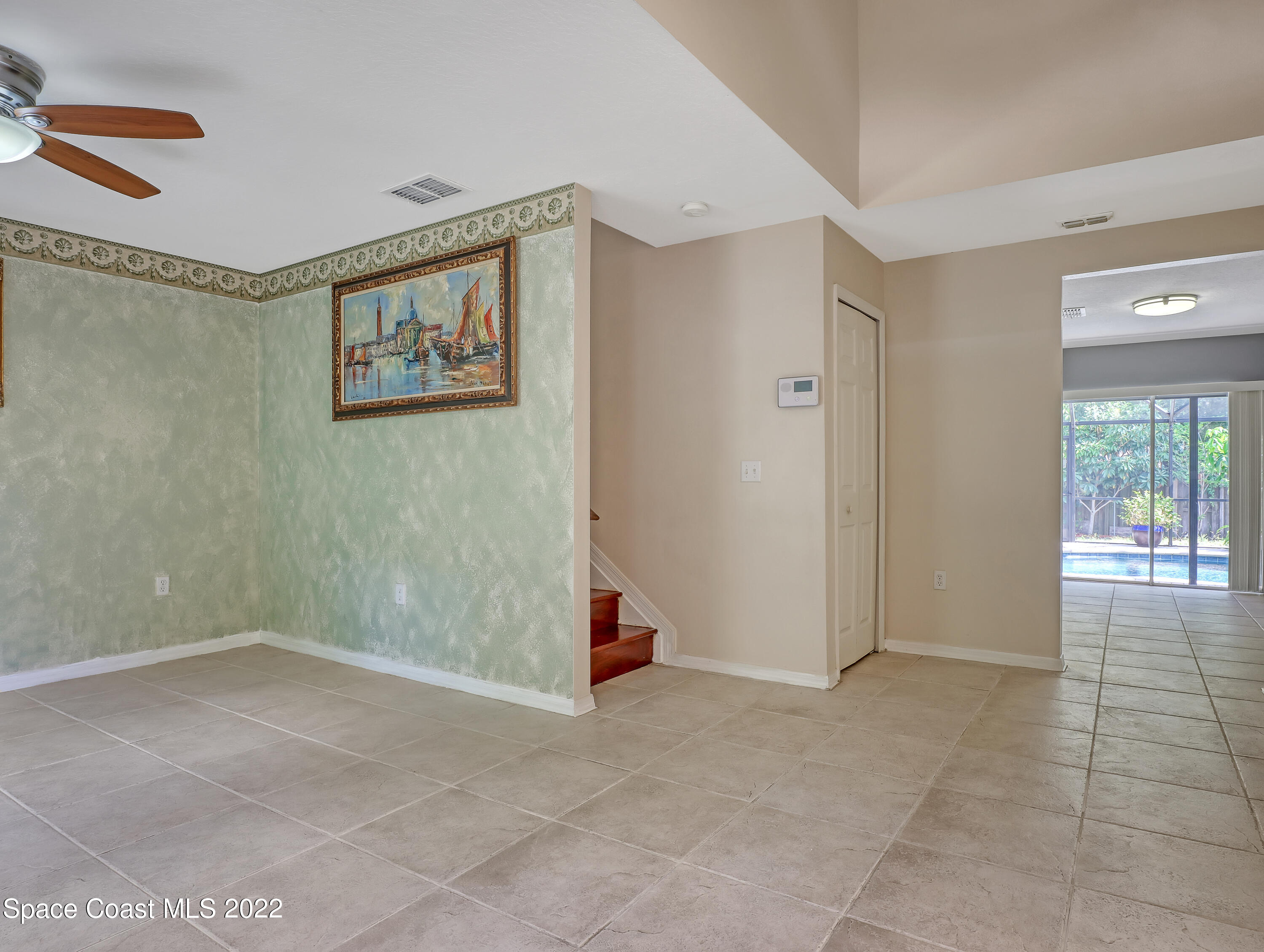 4764 Doreen Road Cocoa, FL 32927 - Photo 6 of 54 a view of an empty room with a window