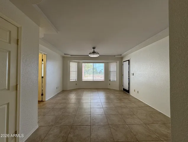 a view of an empty room and window