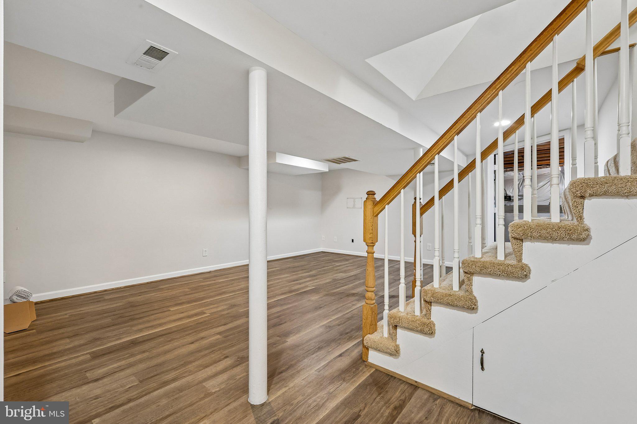 10217 Rodgers Road Fairfax, VA 22030 - Photo 18 of 27 New carpet on Lower-level staircase