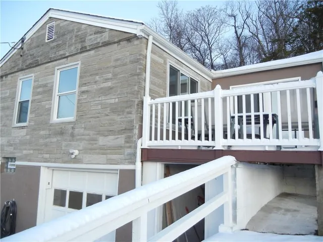 a view of a house with a deck